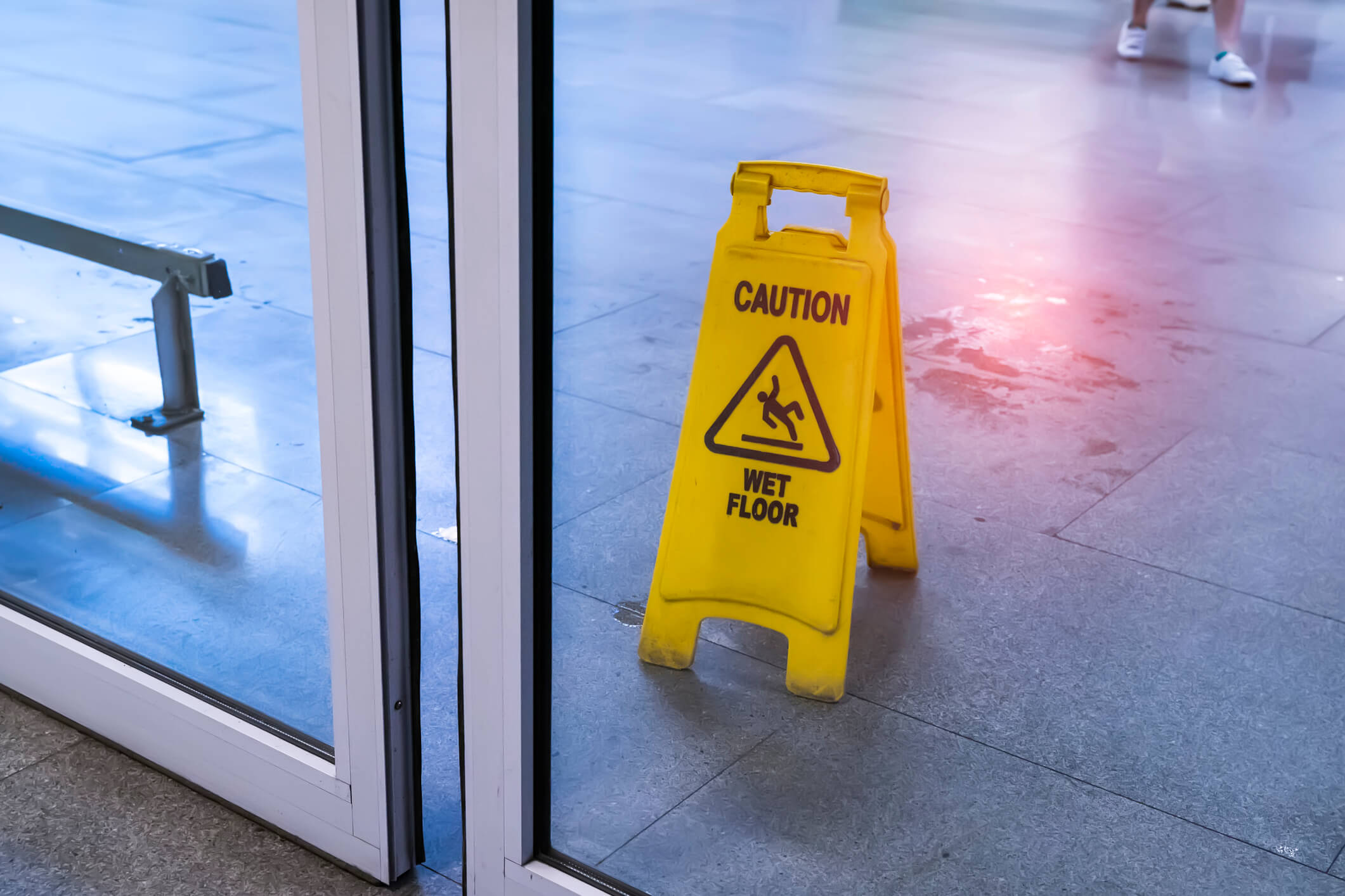 A warning sign to prevent a slip and fall case.